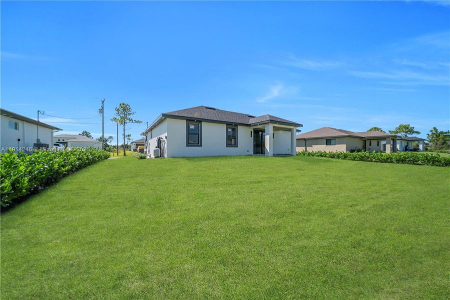 Exterior details and patio area of a home in , Lehigh Acres (Image 3). Exterior details and patio area of a home in , Lehigh Acres (Image 3).