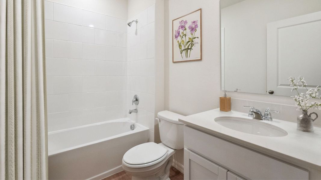 Representative furnished interior of a home built from the Madison by D.R. Horton in Harmony West, St. Cloud (Image 11).