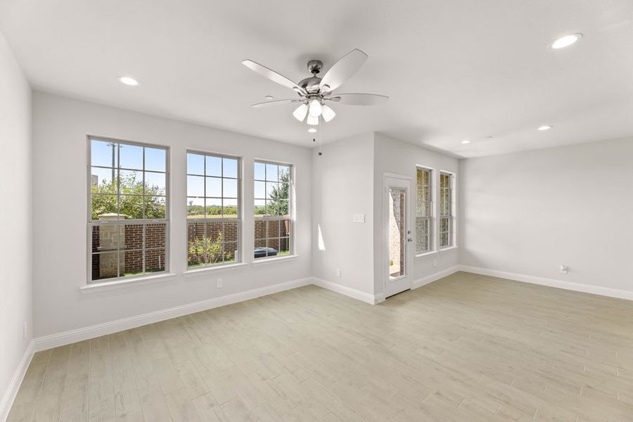 Front exterior of a new home in Main Street Village, Mansfield, TX, highlighting curb appeal (Image 7). Front exterior of a new home in Main Street Village, Mansfield, TX, highlighting curb appeal (Image 7).