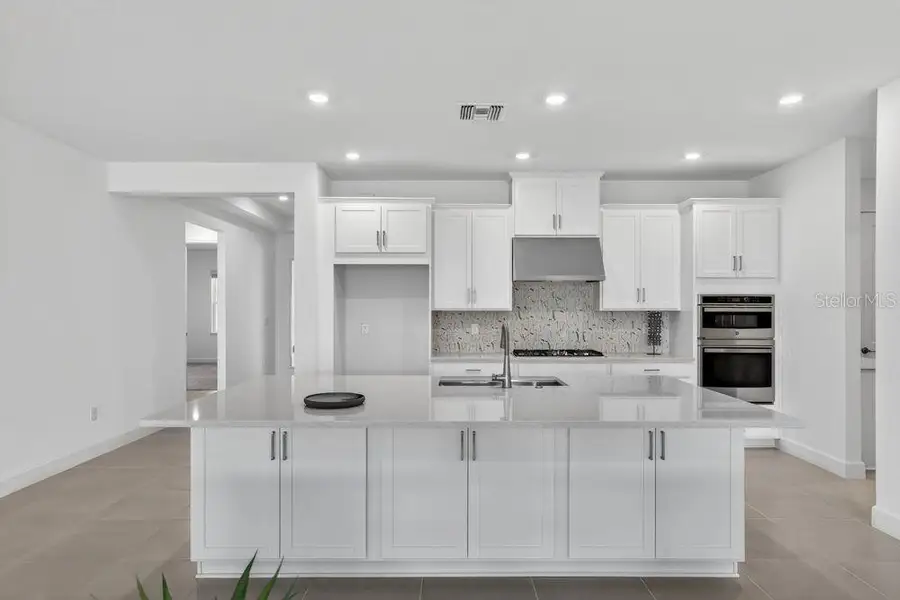 Furnished interior view inside a new home in Hammock at Two Rivers, Zephyrhills (Image 14).