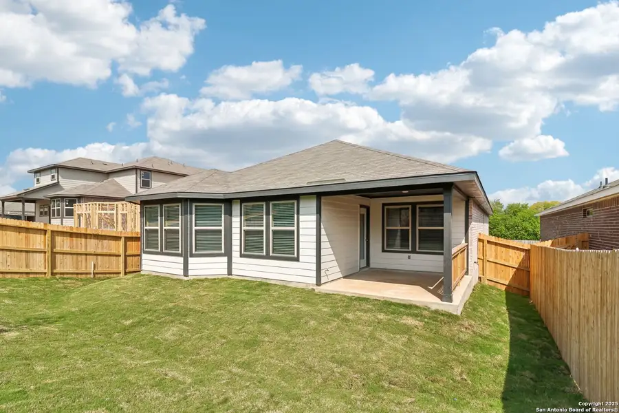 Front exterior of a new home in Comanche Ridge, San Antonio, TX, highlighting curb appeal (Image 2).