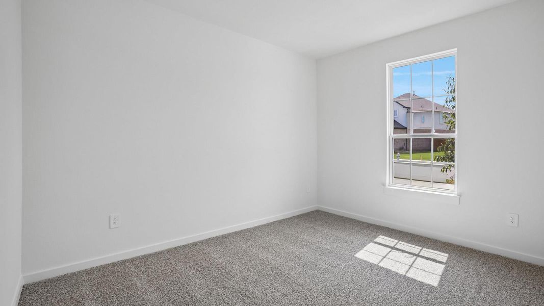 Spacious, unfurnished interior of a new home in Rosenbusch Ranch, Leander (Image 16).