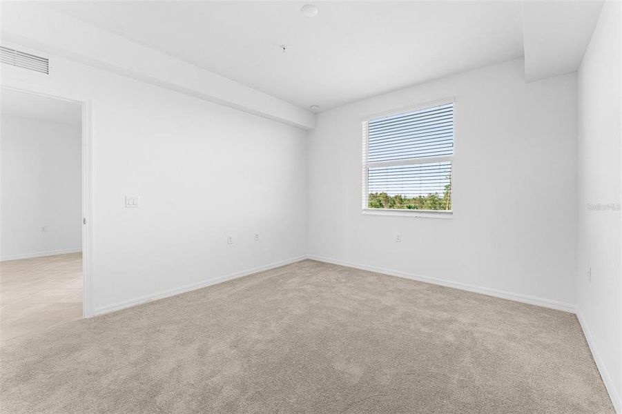 Spacious, unfurnished interior of a new home in Heritage Landing: Veranda Condominiums, Punta Gorda (Image 23).