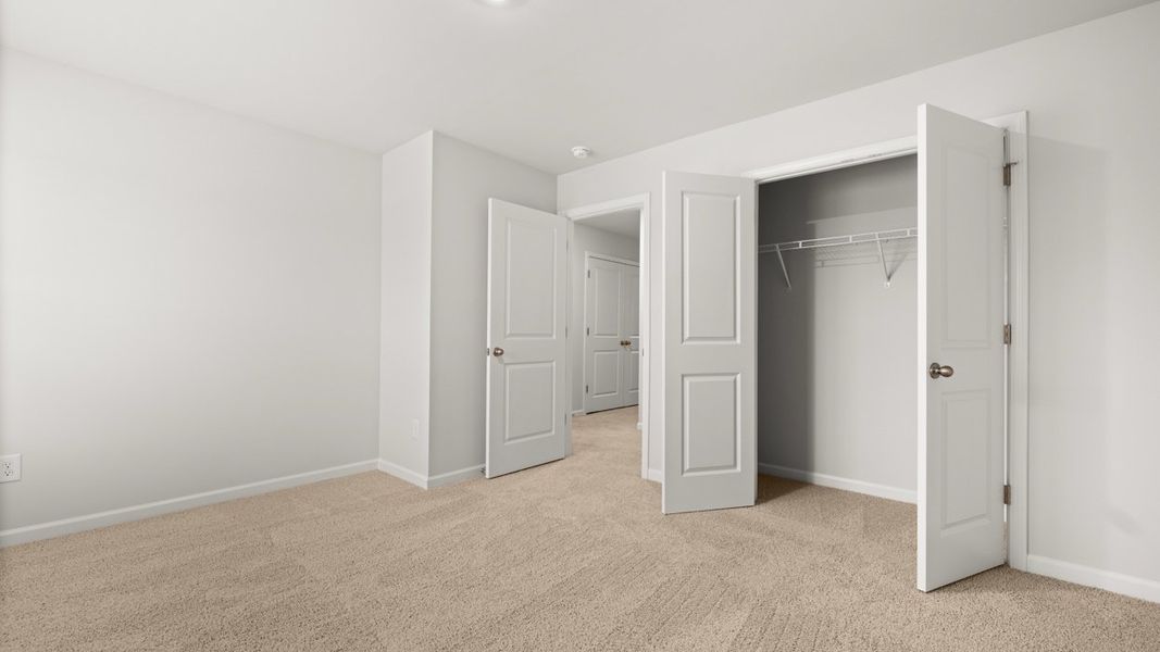 Representative unfurnished interior of a home built from the Halton by D.R. Horton in Highland Hills, Graniteville (Image 28).