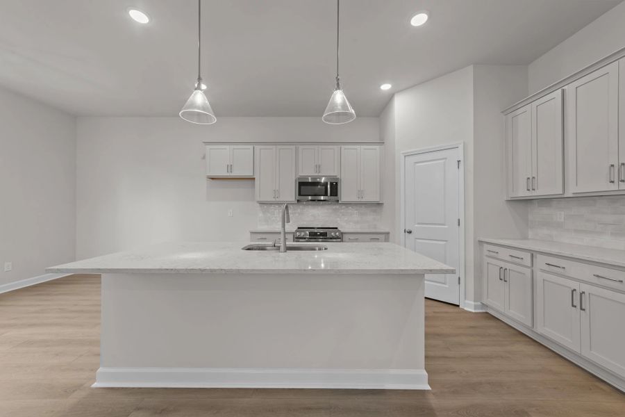 Furnished interior view inside a new home in Blue Heron Retreat: Oasis Series, Little River (Image 7).