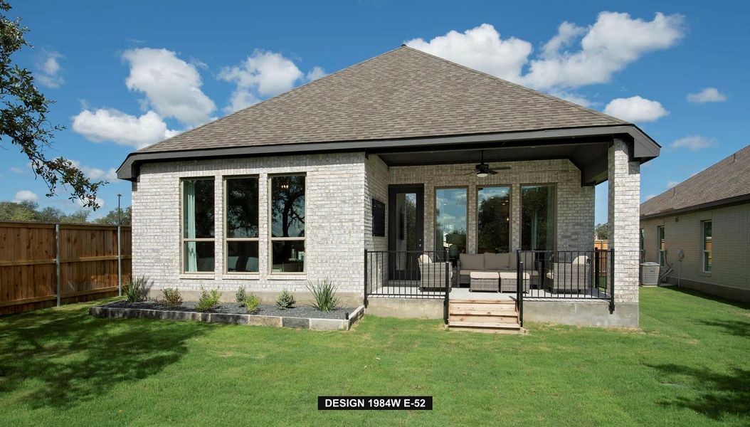 Back of house featuring brick siding, ceiling fan, a shingled roof, a patio area, and an outdoor hangout area