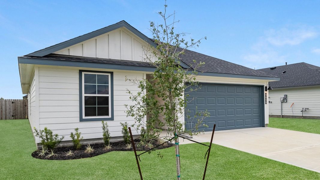 Front exterior of a new home in Reserve at Mallard Lakes, Orange, TX, highlighting curb appeal (Image 14). Front exterior of a new home in Reserve at Mallard Lakes, Orange, TX, highlighting curb appeal (Image 14).