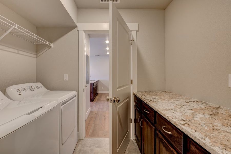 Furnished interior view inside a new home in The Lakes at Centerra - North Shore Flats, Loveland (Image 1).