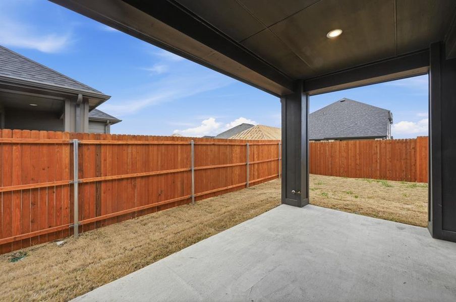 Exterior details and patio area of a home in Heartland, Heartland (Image 2).