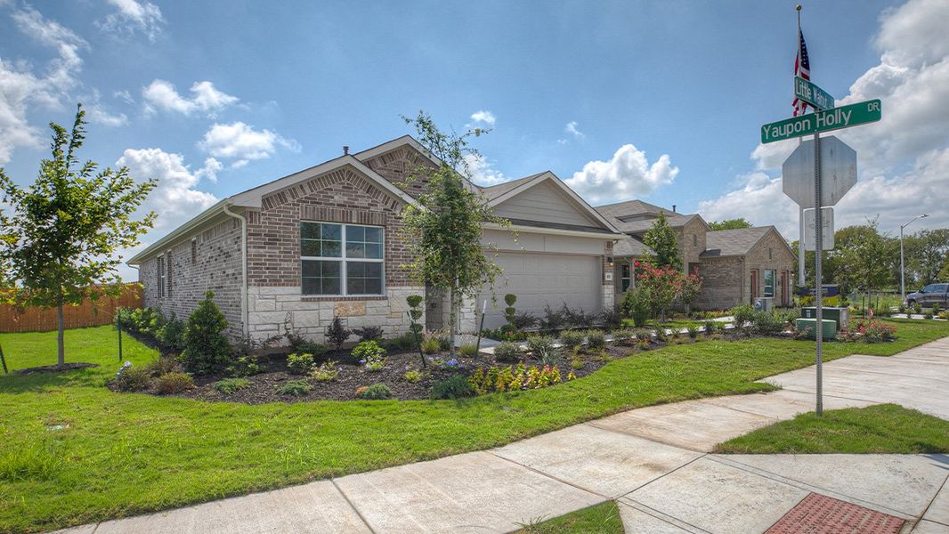 Representative exterior photo of a completed home built from the The Reagan by D.R. Horton in Southgrove, Kyle, TX (Image 2). Representative exterior photo of a completed home built from the The Reagan by D.R. Horton in Southgrove, Kyle, TX (Image 2).