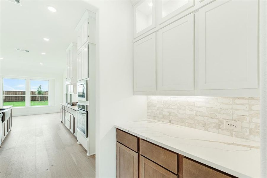 Furnished interior view inside a new home in Mosaic, Celina (Image 15).