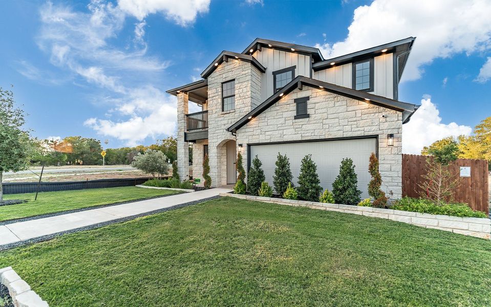 Representative exterior photo of a completed home built from the Dakota by CastleRock Communities in Hughes Landing, Dickinson, TX (Image 26).