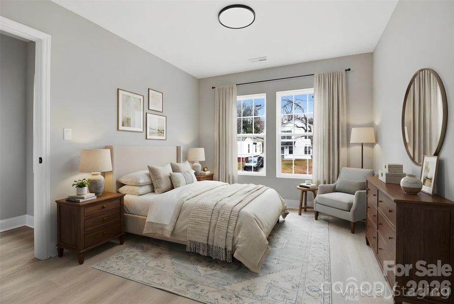 Walking into the third bedroom on second floor (virtually staged/enhanced).