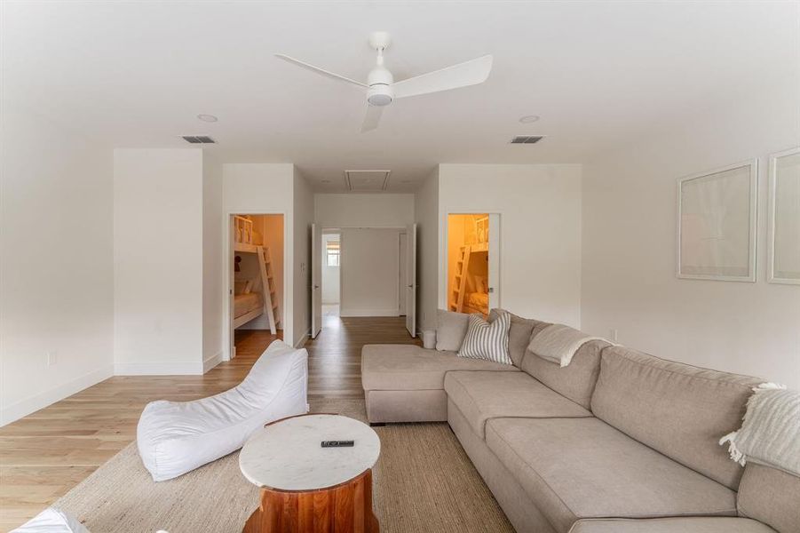 Unfurnished bedroom with wood finished floors and baseboards Unfurnished bedroom with wood finished floors and baseboards