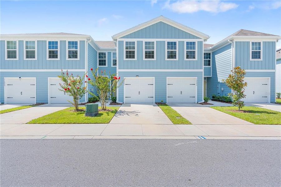 Front exterior of a new home in , New Port Richey, FL, highlighting curb appeal (Image 2). Front exterior of a new home in , New Port Richey, FL, highlighting curb appeal (Image 2).