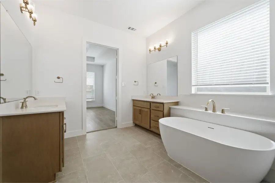Furnished interior view inside a new home in Green Meadows, Celina (Image 13).