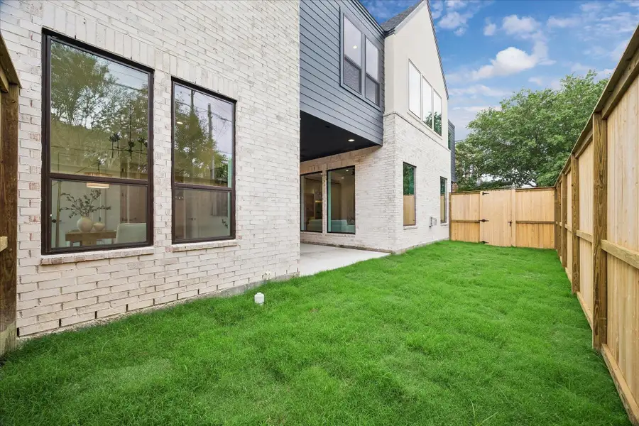 Spacious backyard with privacy fencing. Spacious backyard with privacy fencing.