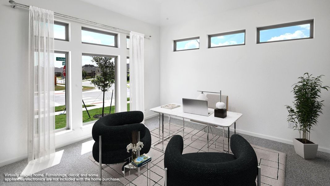 Carpeted home office featuring baseboards Carpeted home office featuring baseboards