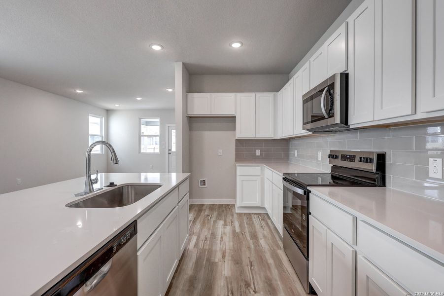 Furnished interior view inside a new home in Mesa Vista, San Antonio (Image 7).