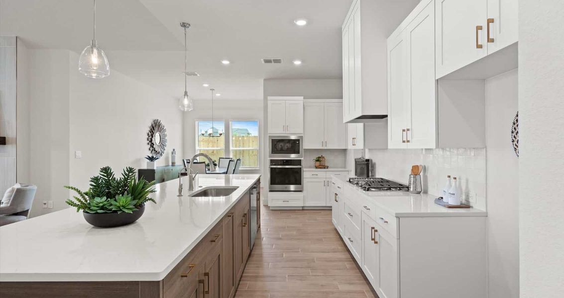 Representative furnished interior of a home built from the Wyatt by Chesmar Homes in Sunfield, Buda (Image 3).
