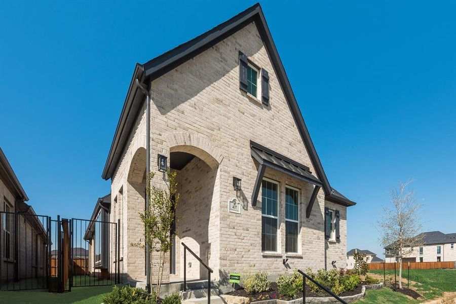 Exterior details and patio area of a home in Cottages of Celina, Celina (Image 3).