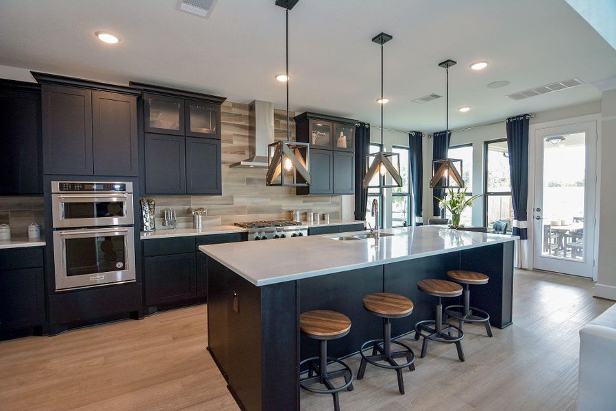 Furnished interior view inside a new home in Bridgeland, Cypress (Image 8).