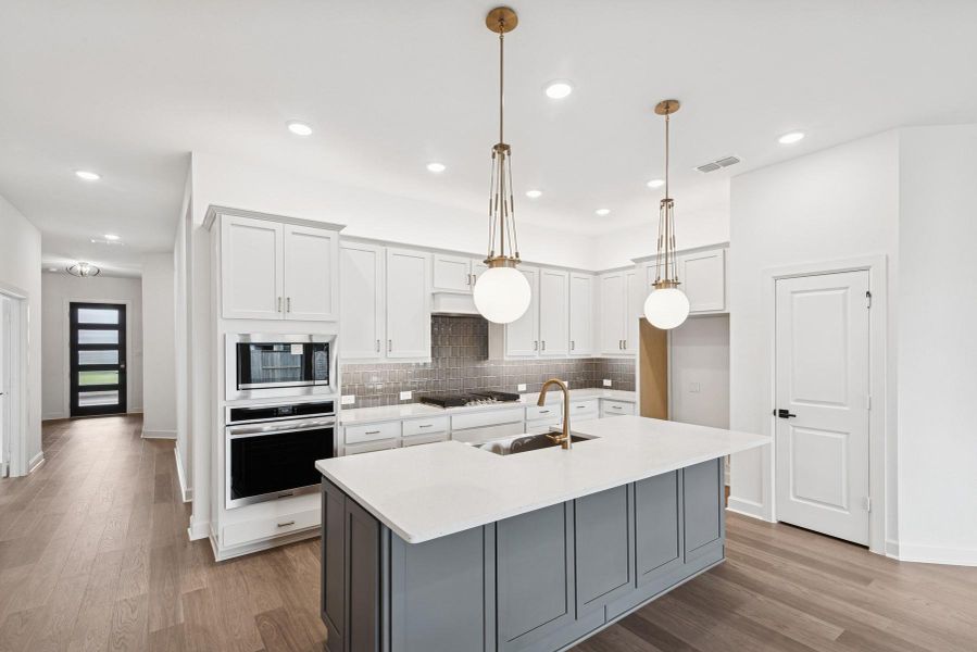 Furnished interior view inside a new home in Meridiana 55' Homesites, Manvel (Image 3).