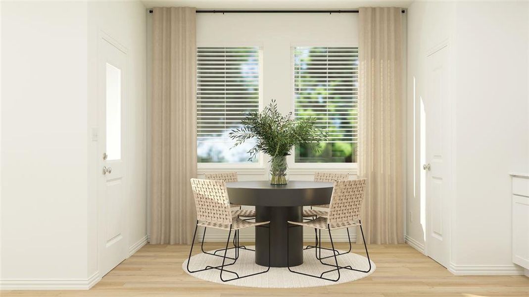 Dining space featuring light hardwood / wood-style floors