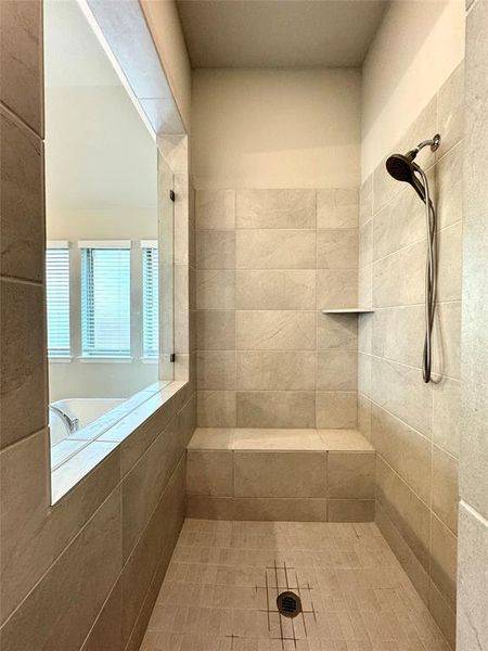 Primary bath – huge walk-in shower with bench seat