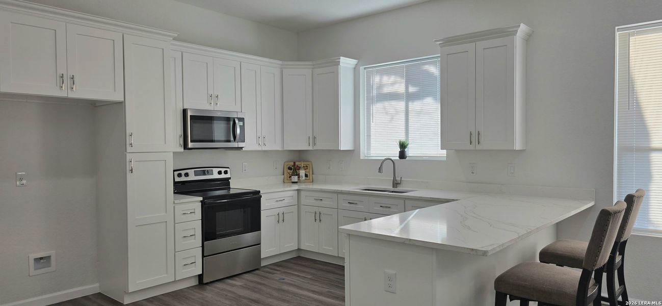 Furnished interior view inside a new home in , San Antonio (Image 12).