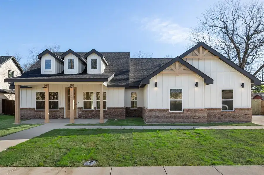 Front exterior of a new home in , Terrell, TX, highlighting curb appeal (Image 21).