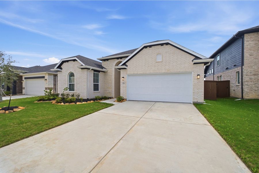 Front exterior of a new home in Creekhaven, Arcola, TX, highlighting curb appeal (Image 27).