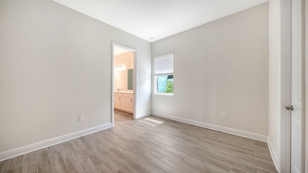 Spacious, unfurnished interior of a new home in Canoe Creek Real Estate and Homes for Sale in Parrish, FL - Neal Communities, Parrish (Image 58).