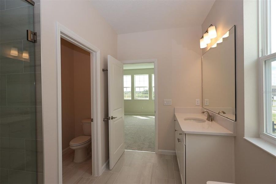 Furnished interior view inside a new home in Lake Star at Ovation, Winter Garden (Image 9).