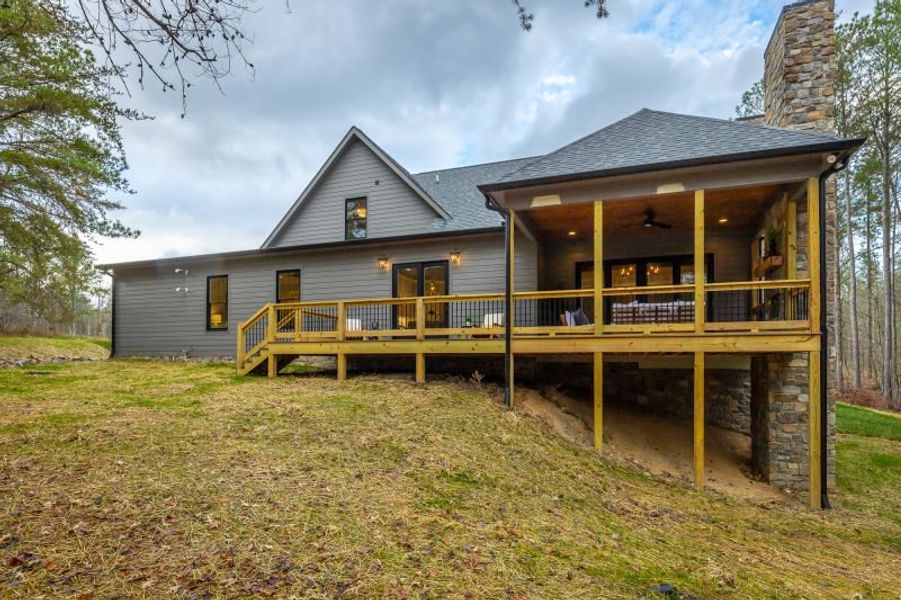 Exterior details and patio area of a home in River Gorge Ranch, Guild (Image 49).