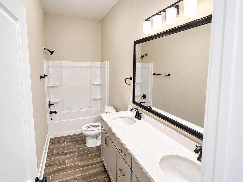 DSLD HOMES NEW CONSTRUCTION MOVE IN READY HOME IN LONGLEAF COMMUNITY LOCATED IN LUMBERTON, TX - Guest bathroom