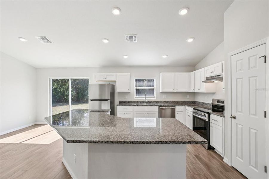 Furnished interior view inside a new home in , Port Charlotte (Image 5).