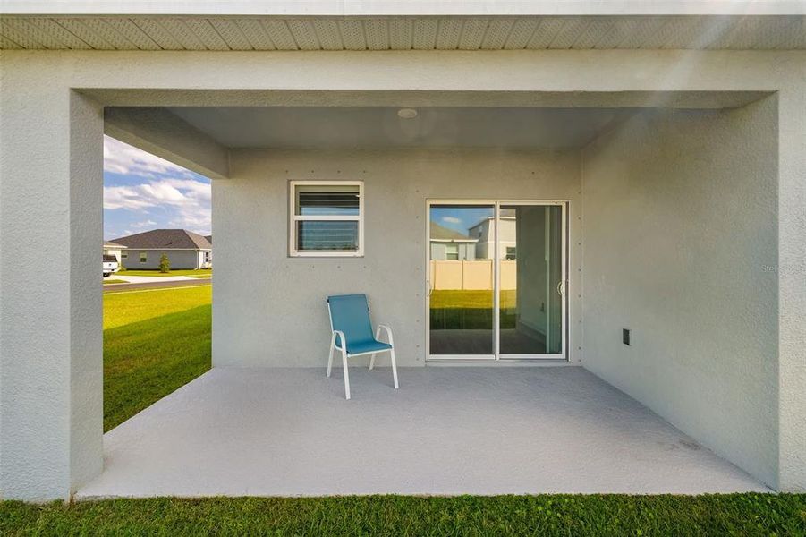 Exterior details and patio area of a home in Broadleaf, Parrish (Image 21).