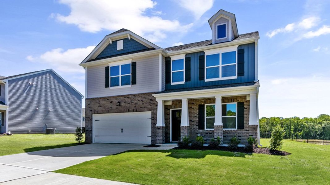 Representative exterior photo of a completed home built from the WILMINGTON by D.R. Horton in Swift Creek Farm, Clayton, NC (Image 16).