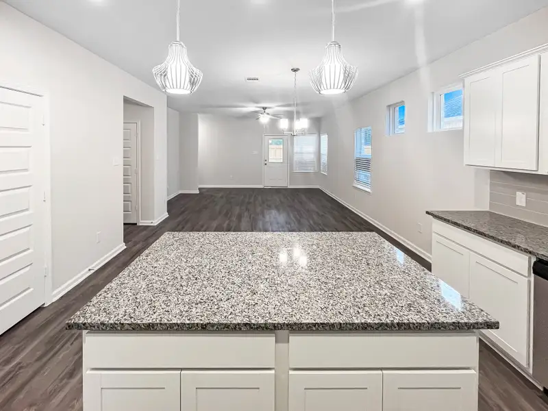 The Kettering II- Kitchen into Family Room The Kettering II- Kitchen into Family Room