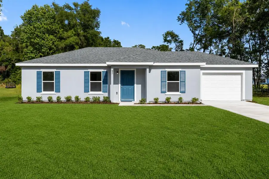 Front exterior of a new home in , Ocala, FL, highlighting curb appeal (Image 16).