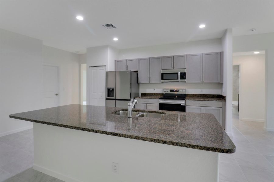 Furnished interior view inside a new home in , Port St. Lucie (Image 4).