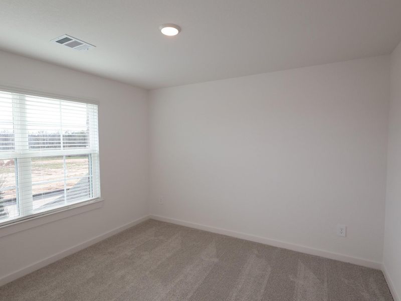 Spacious, unfurnished interior of a new home in Lone Star Landing, Montgomery (Image 27).
