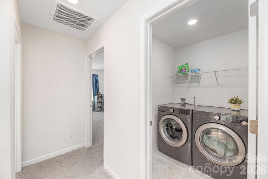 Upstairs laundry room.