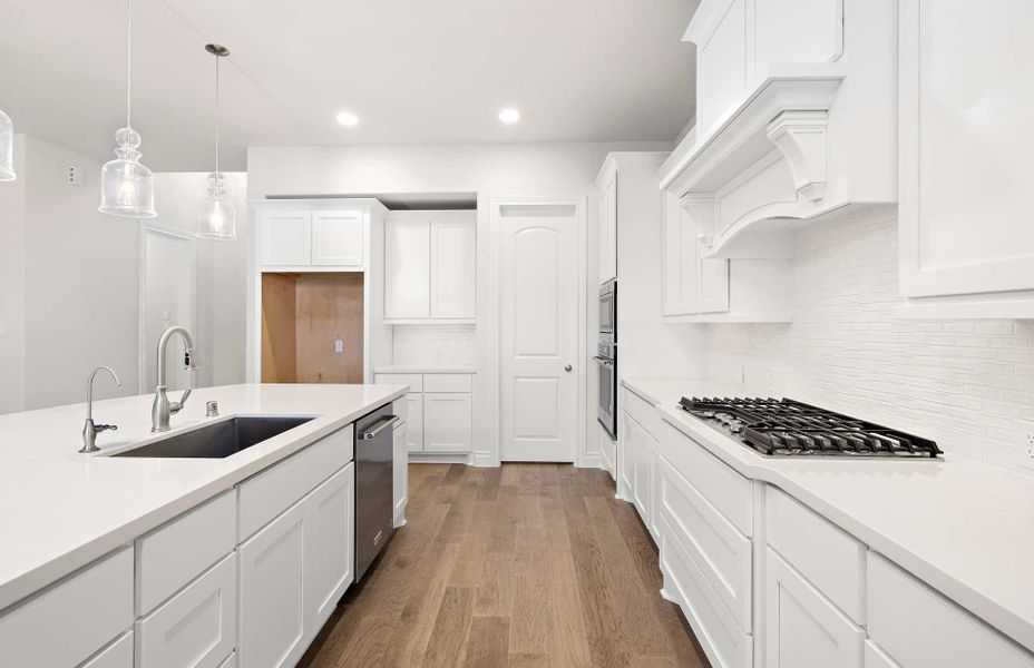 Representative furnished interior of a home built from the 3099 by Ravenna Homes in The Highlands 55′, Porter (Image 8). Representative furnished interior of a home built from the 3099 by Ravenna Homes in The Highlands 55′, Porter (Image 8).