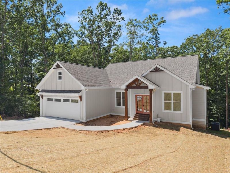 Front exterior of a new home in , Gainesville, GA, highlighting curb appeal (Image 21).