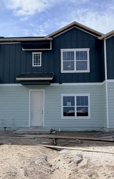 In-progress construction of a new home in Whaley Grove Townhomes, St. Cloud, FL (Image 11).