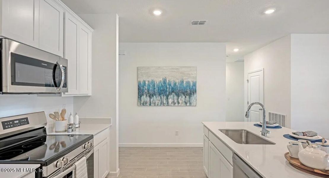 Furnished interior view inside a new home in Trailmark, St. Augustine (Image 21).