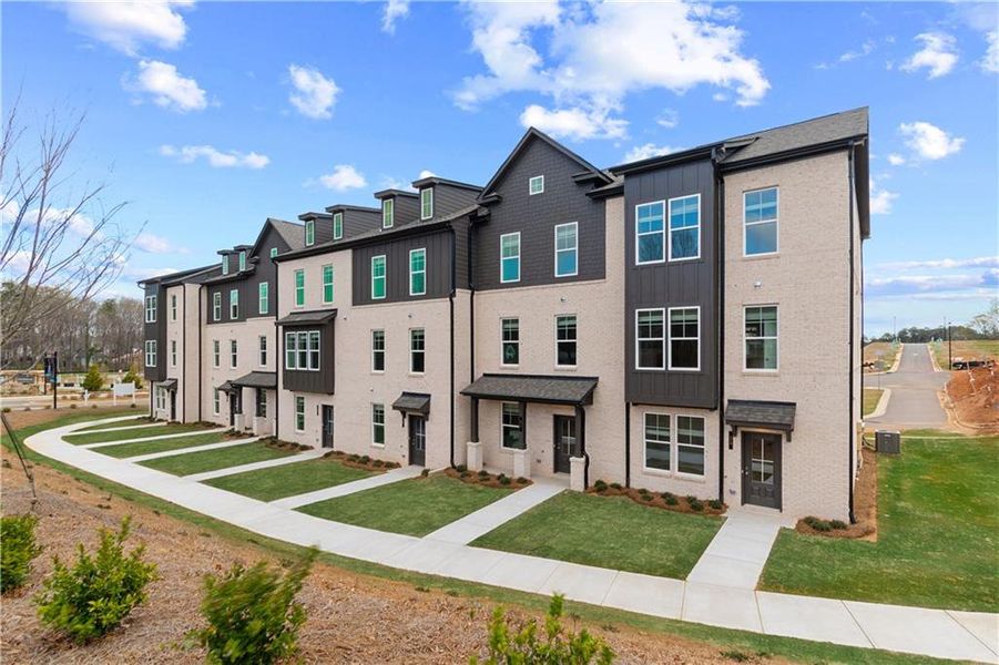 Front exterior of a new home in Daybreak, Newnan, GA, highlighting curb appeal (Image 16).