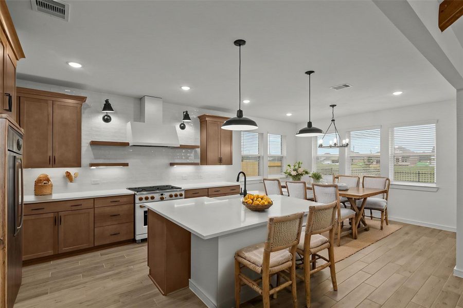Stunning island kitchen (*Photo not of actual home and used for illustration purposes only.)